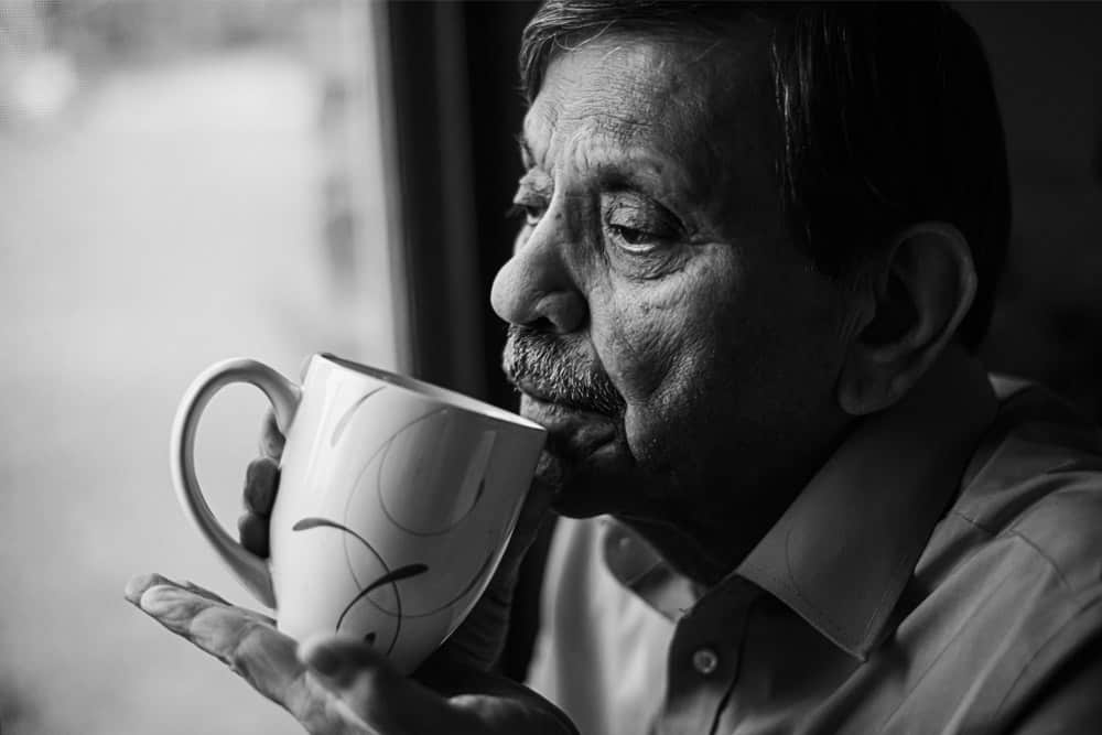 Portrait Photography - man drinking tea